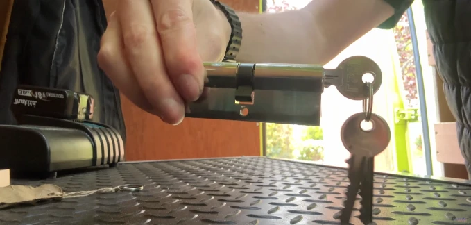 Mobile locksmith technician servicing a lock, representing Pine Belt Locksmith's service area across the Hattiesburg region